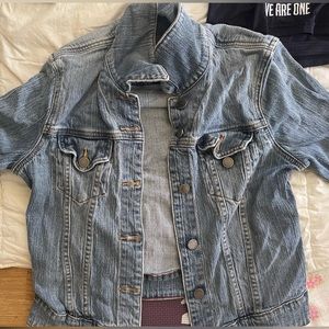 Grown out of faded Calvin Klein jeans jacket size women Large